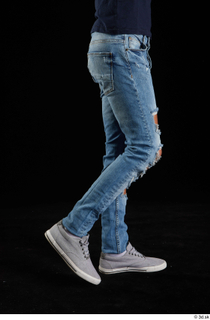 Claudio  1 blue jeans calf clothing flexing grey sneakers…